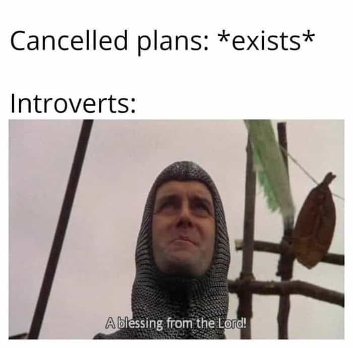 A legendary Monty Python introvert meme showing a knight looking to the sky with religious gratitude, declaring "A blessing from the Lord!" upon discovering that cancelled plans exist.