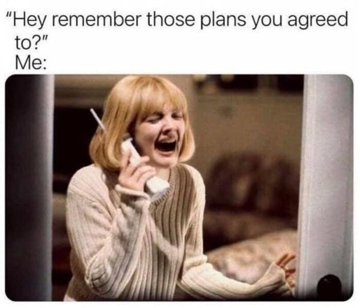 An iconic introvert meme showing a frantic, crying Drew Barrymore gripping a telephone, perfectly capturing the utter panic of someone reminding you about the plans you foolishly agreed to earlier.