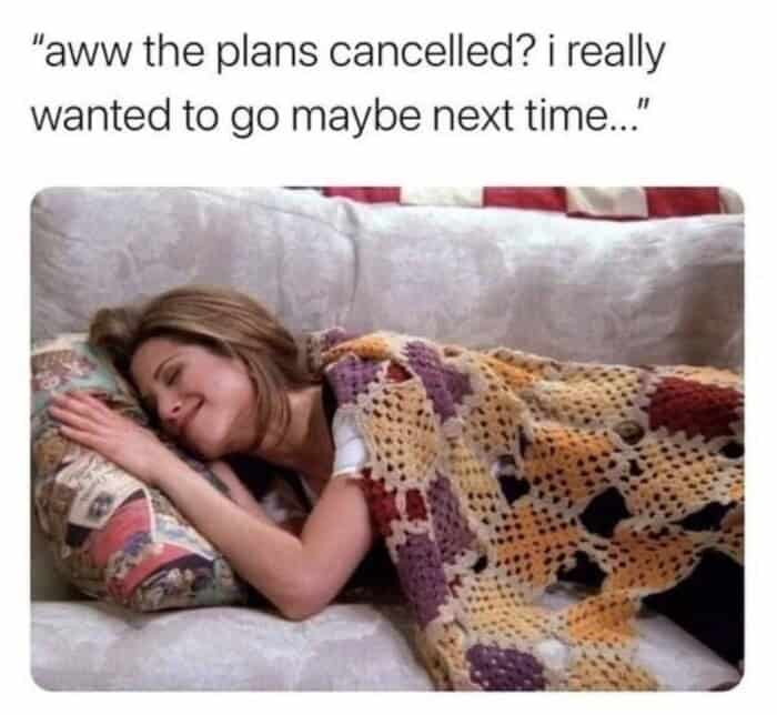 A deeply relatable social anxiety meme showing Rachel from Friends peacefully sleeping under a cozy crochet blanket with a content smile, depicting the immense relief of pretending to be sad when plans are finally cancelled.