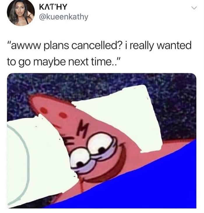 A classic introvert meme featuring Patrick Star grinning deviously in bed under the covers, completely thrilled while feigning disappointment about cancelled plans in a text message.