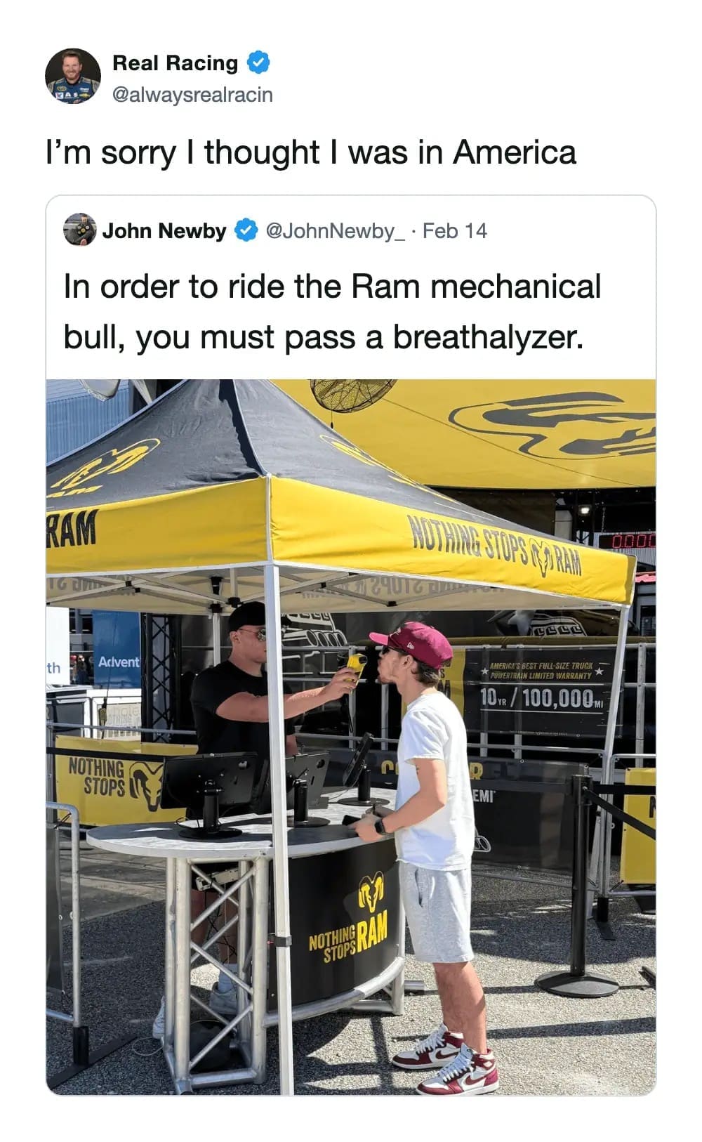A hilarious freedom-loving funny meme showing a man being forced to take a breathalyzer test just to ride a promotional Ram Trucks mechanical bull at an event, paired with the ultimate disappointed meme dump caption, "I'm sorry I thought I was in America".