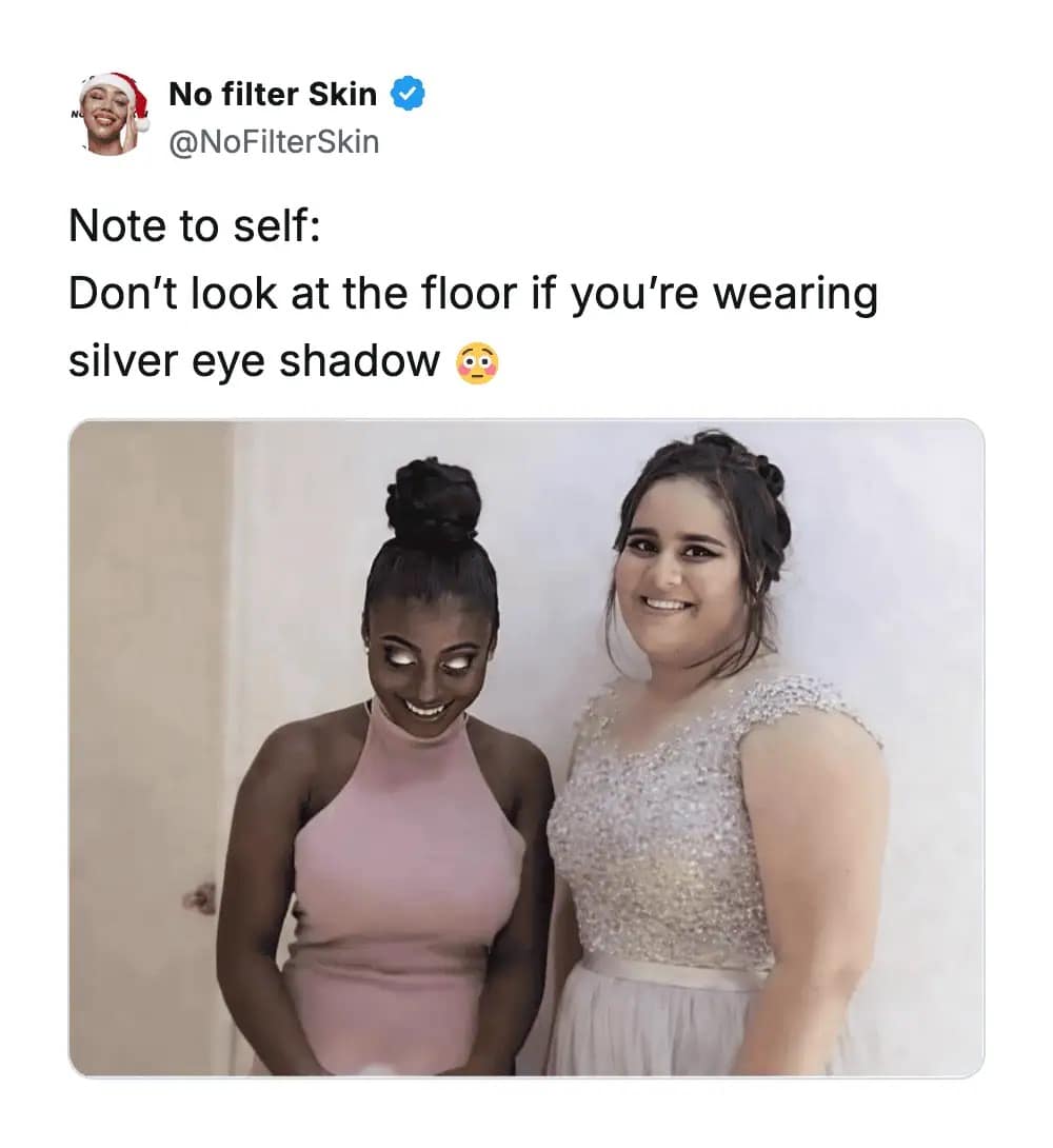 Two women posing for a photo where one accidentally looks terrifying because her silver eyeshadow creates glowing white demonic eyes when looking down. A funny addition to a meme dump