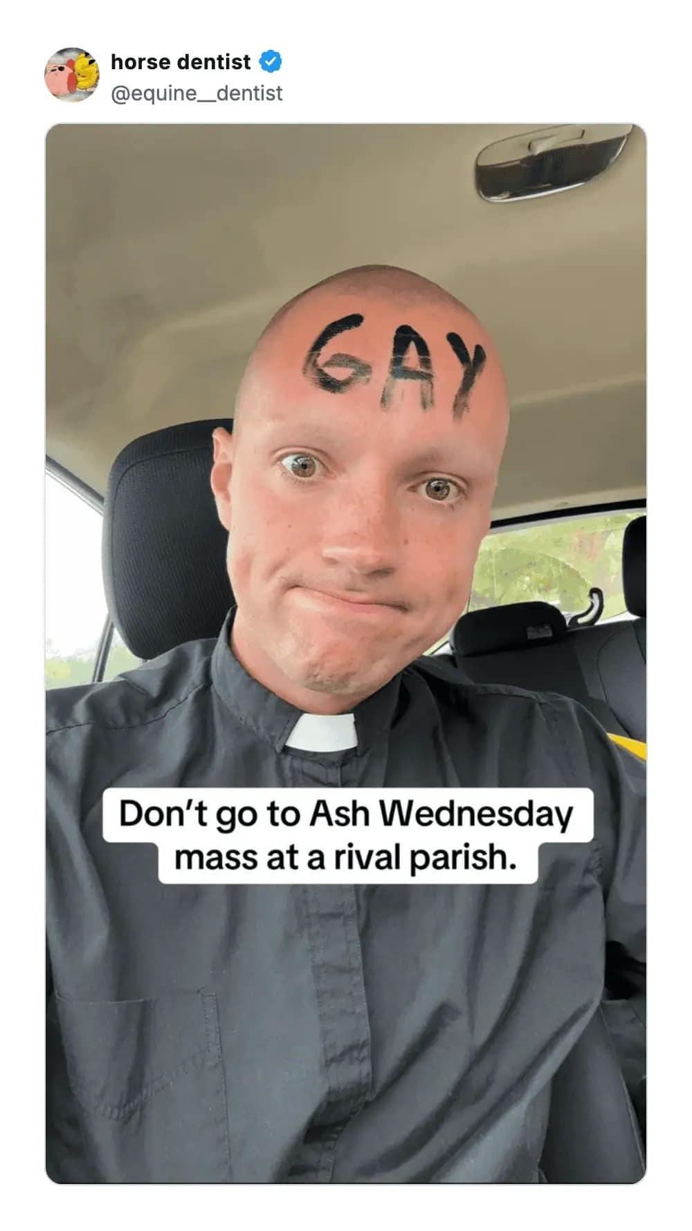 An absurd religious funny meme showing a bald man in a priest collar looking unamused with the word "GAY" written aggressively in black marker across his forehead, jokingly warning people not to attend Ash Wednesday mass at a rival parish, a perfect meme dump find.
