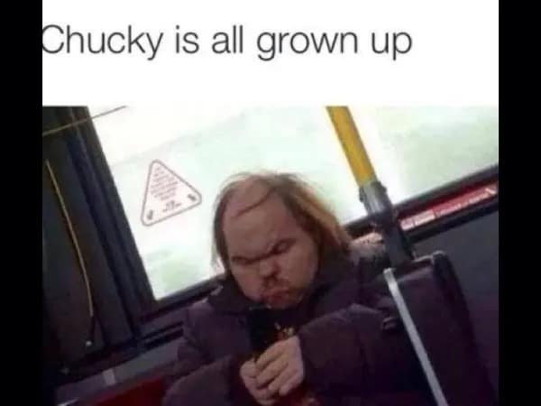 A savage funny meme from a meme dump showing a candid photo of a very short, intensely focused person riding public transit, ruthlessly captioned "Chucky is all grown up" due to their uncanny resemblance to the iconic horror movie doll.