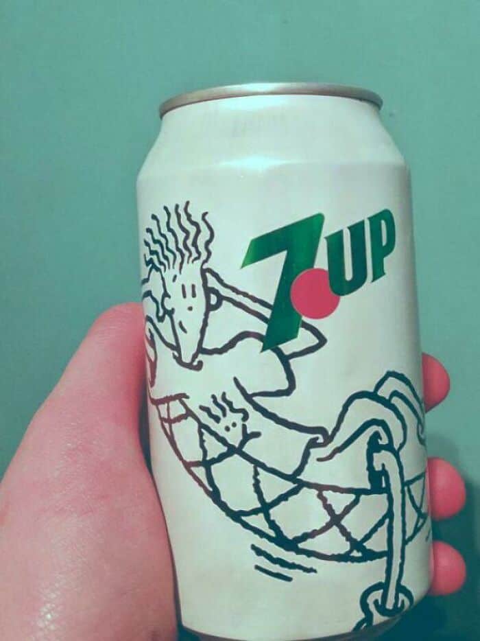 A vintage 7Up can featuring the cool cartoon mascot Fido Dido, a definitive symbol of 90s nostalgic drink marketing.