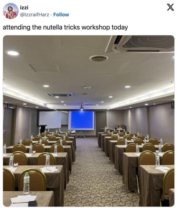 A Nutella tricks meme showing an empty hotel conference room captioned "attending the nutella tricks workshop today."
