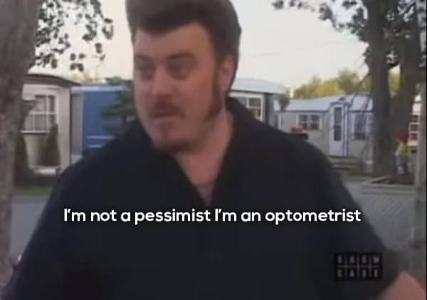 Close up of Ricky confidently claiming that he is not a pessimist but an optometrist.
