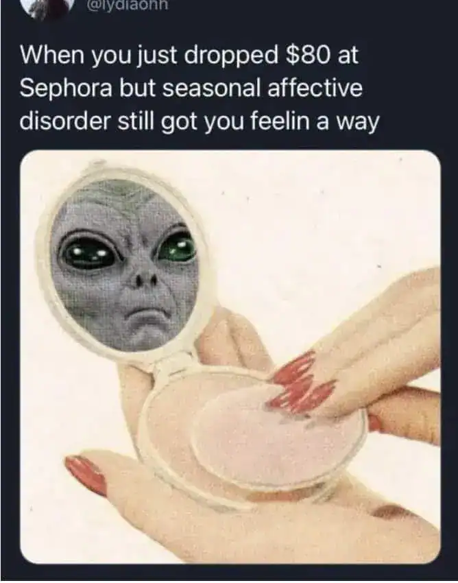 Vintage illustration of an alien looking in a makeup compact after spending money at Sephora.