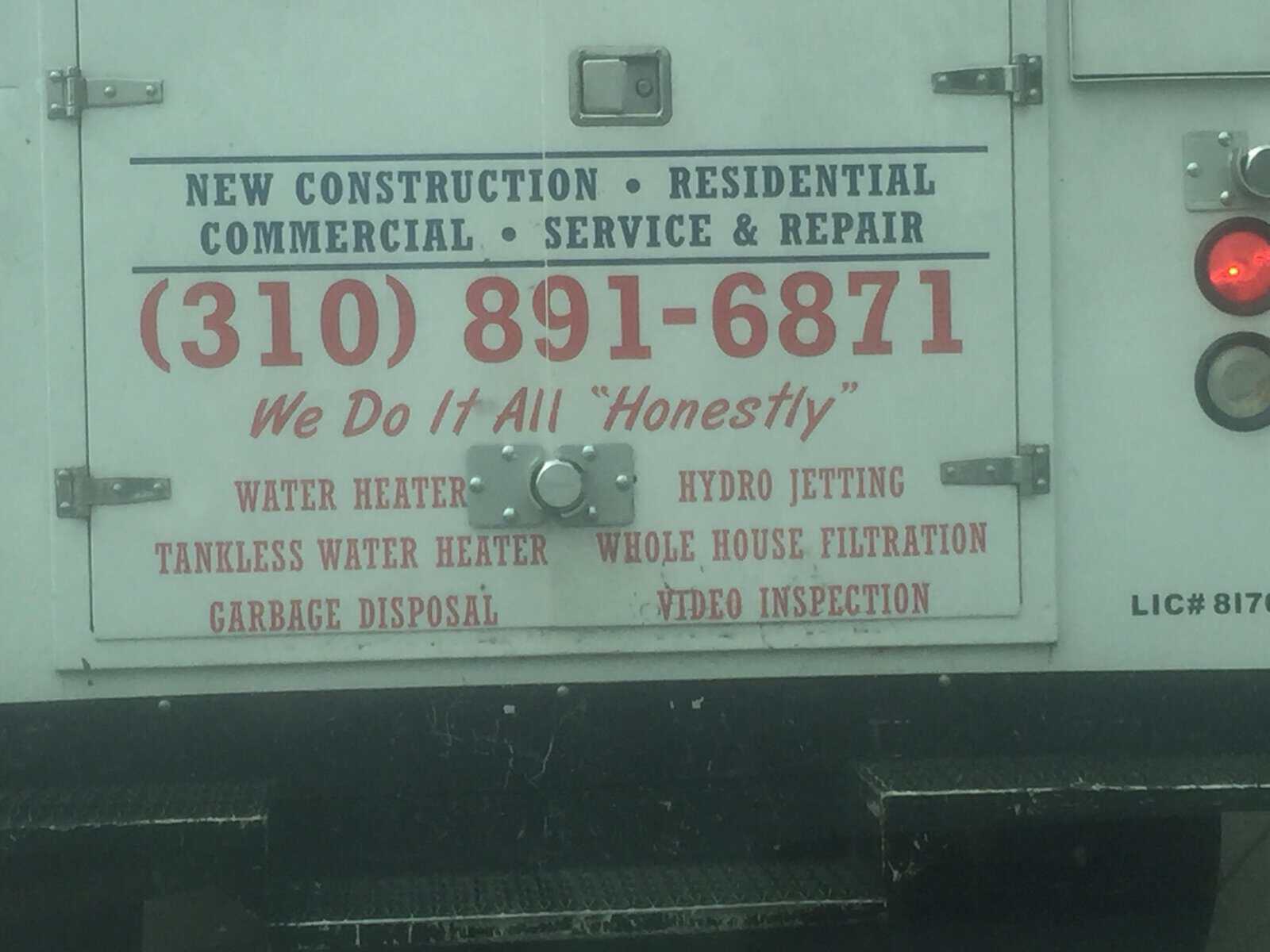 Commercial service truck with the slogan We Do It All Honestly in quotation marks.