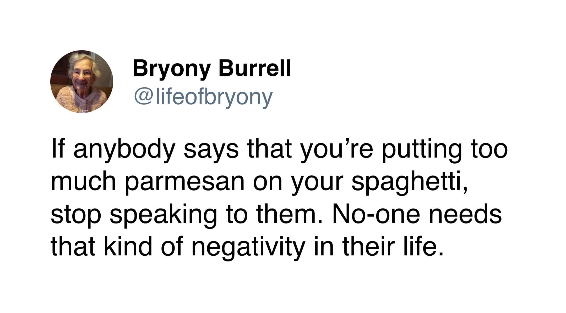 A funny Bryony Burrell tweet advising followers to cut negativity out of their lives, specifically targeting anyone who criticizes putting "too much parmesan on your spaghetti."
