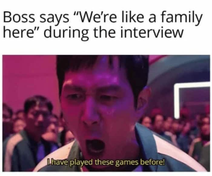 A brilliant work meme using a panicked Squid Game character yelling "I have played these games before!" as a massive red flag reaction to a boss claiming "We're like a family here" in a job interview.
