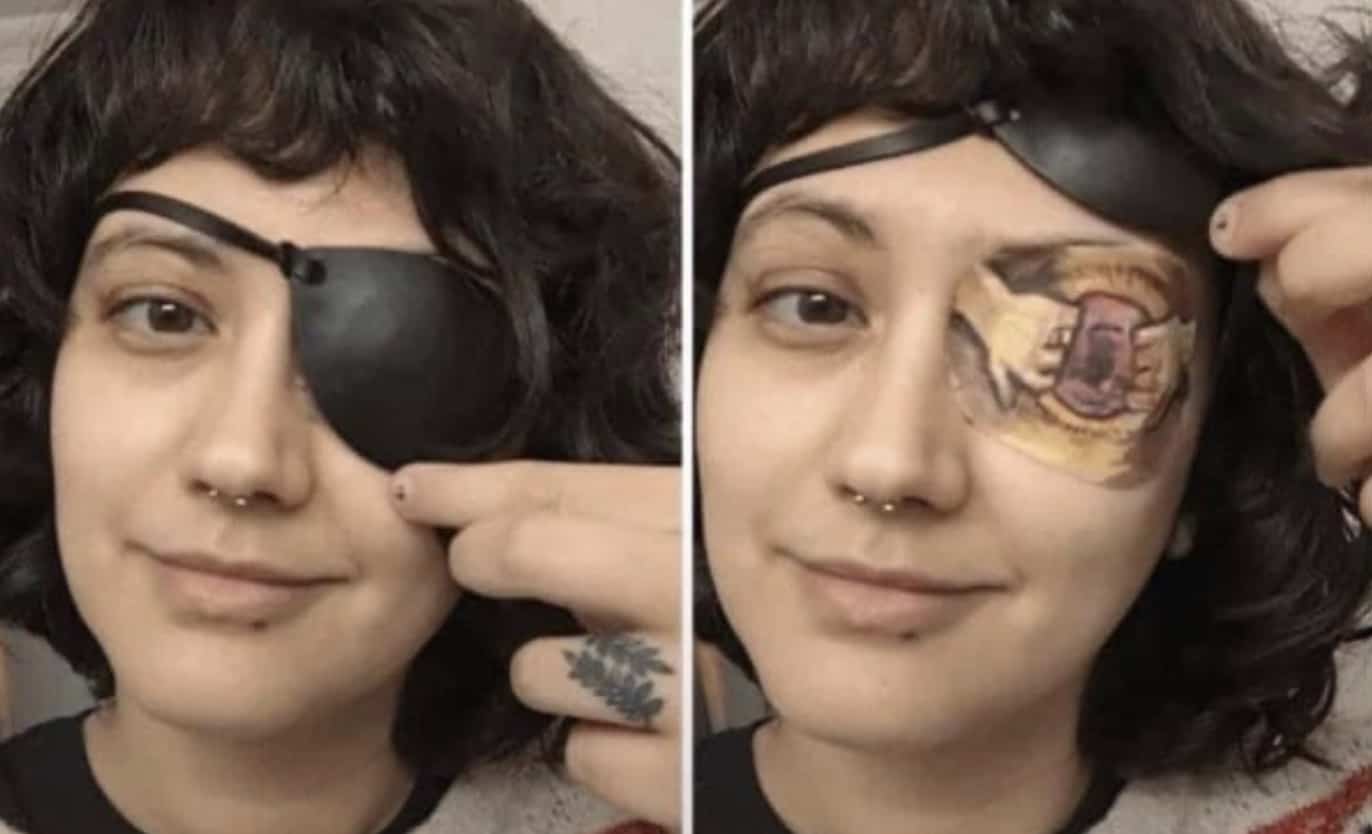 Two-panel selfie shows person lifting eyepatch to reveal cartoon tattoo underneath