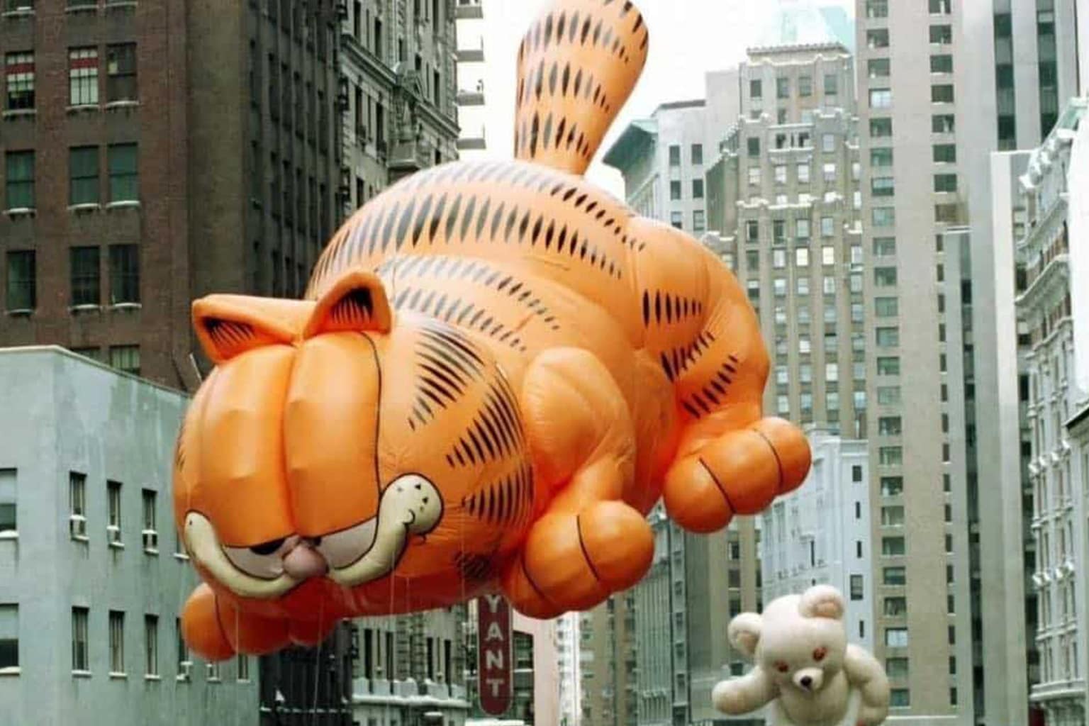 90s memes compilation: A collage featuring Pauly Shore as the gatekeeper of country music fans, the silver Panasonic CD player’s "anti-skip" system labeled as the decade's biggest lie, and an elderly Red Power Ranger leaning on a cane to remind millennials they are getting old.