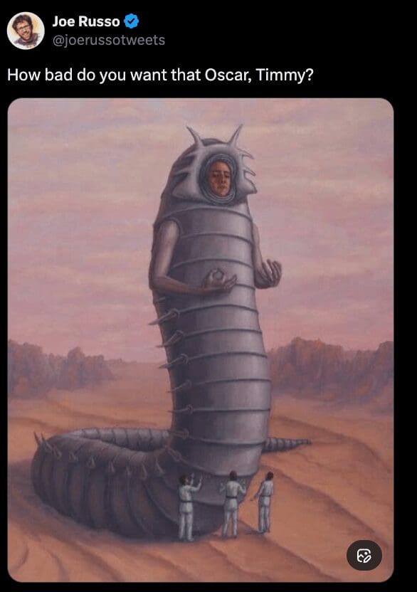 Joe Russo contributes to the Dune memes collection by posting an eerie illustration of a human-faced worm creature (Leto II) and jokingly asking Timothée Chalamet how badly he wants an Oscar.