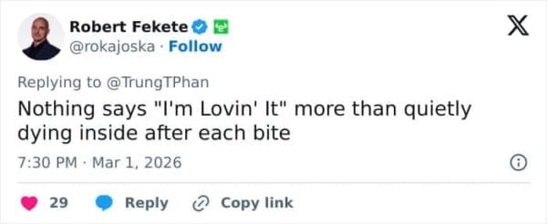 A brutal McDonalds CEO burger meme showcasing a tweet that hilariously contrasts the famous "I'm Lovin' It" slogan with the executive looking like he is quietly dying inside after each bite.