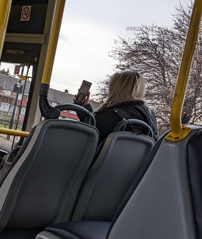 High-volume public video calls are a staple of the unhinged behavior associated with annoying people on public transit, as seen here with a passenger on a city bus