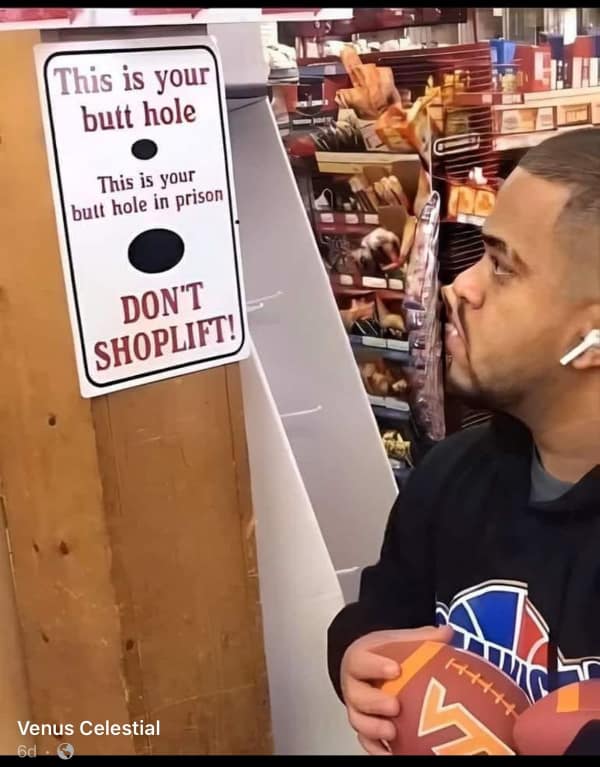 A wild that's a bad idea anti-theft sign in a store that compares a small dot to a massive circle to represent your "butt hole in prison" as a deterrent for shoplifters.