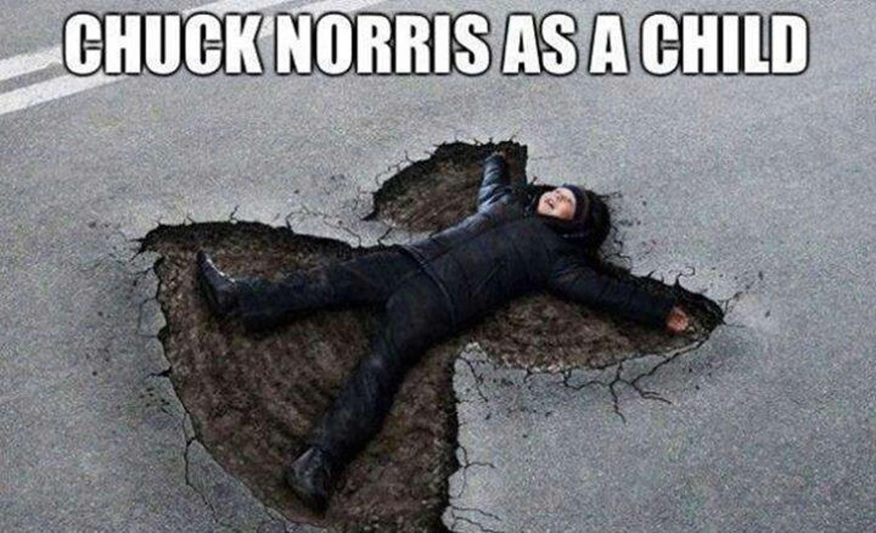 A Chuck Norris memes classic showing a child lying inside a deep, human-shaped impact crater in solid asphalt, captioned "CHUCK NORRIS AS A CHILD."