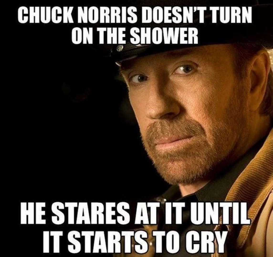 An extreme close-up of Chuck Norris wearing a cowboy hat with an unblinking, steely gaze. The meme asserts that he never turns on the shower; he simply stares at it until the plumbing starts to cry from fear.