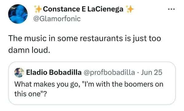 Complaint about the volume of background music in restaurants being too loud for a pleasant meal.