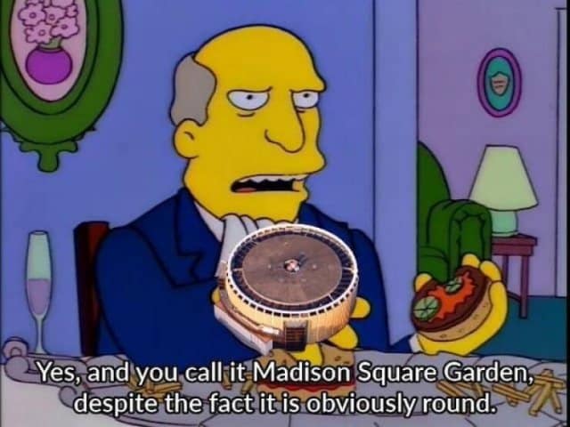 A brilliant Simpsons Steamed Hams classic meme showing Principal Skinner holding a literal round stadium while arguing that calling it Madison Square Garden makes no sense since it is obviously round, a masterful play on old memes.