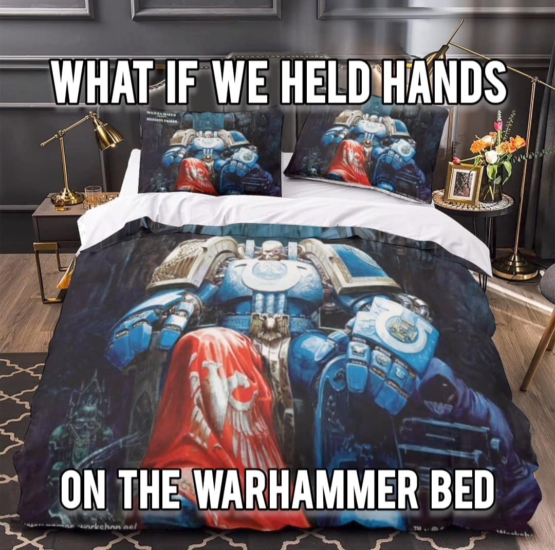 classic meme showcasing an interior shot of a modern bedroom with a highly specific aesthetic: a Warhammer 40,000 themed bedspread and matching pillows. The bold white text asks: "WHAT IF WE HELD HANDS ON THE WARHAMMER BED."