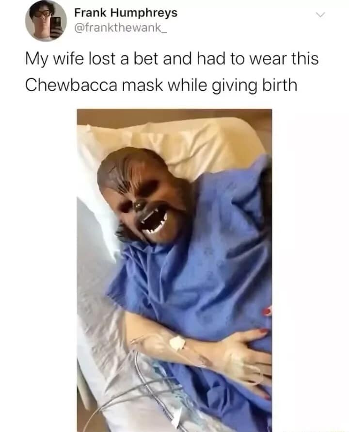 A legendary classic meme showing a woman lying in a hospital bed in a blue gown, wearing a full Chewbacca mask while in labor because she allegedly lost a bet with her husband.