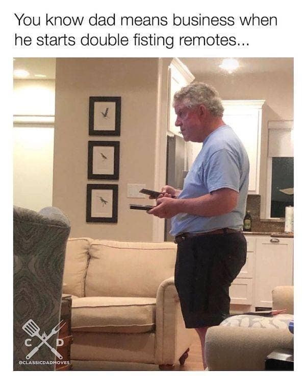 A funny classic meme showing a serious dad intensely staring at the television while double fisting two remotes, capturing peak paternal energy often found in highly relatable old memes.