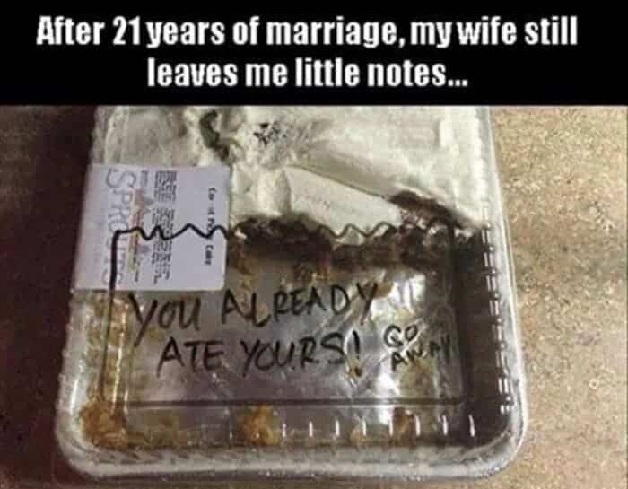 A cake container with a note written on the bottom saying "You already ate yours!"