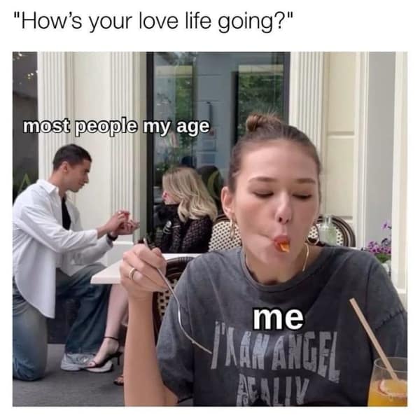 Girl happily eating at a cafe table while a couple gets engaged in the background. Savage food memes highlighting the difference between relationship goals and lunch goals.