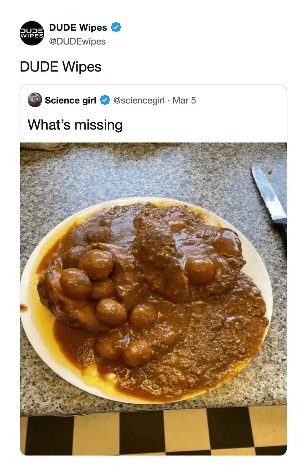 Unappetizing plate of brown meat and gravy with a DUDE Wipes brand social media response.