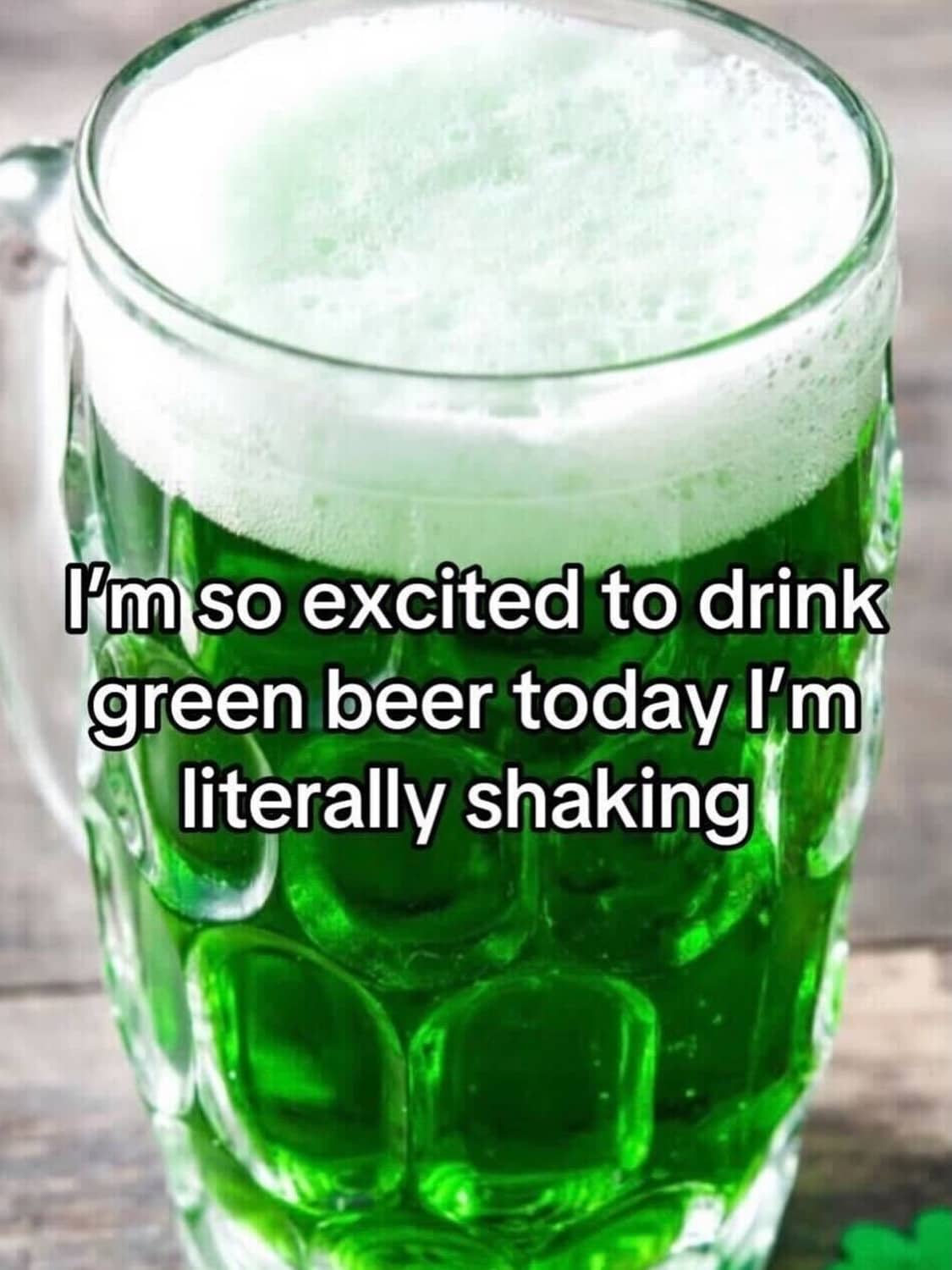 Frothy mug of green beer for St. Patrick's Day with text about being excited.