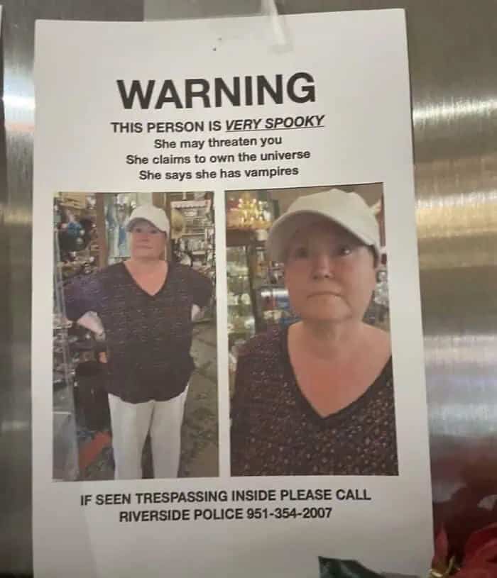Spooky warning flyer featuring a woman in a white hat claiming to own the universe.