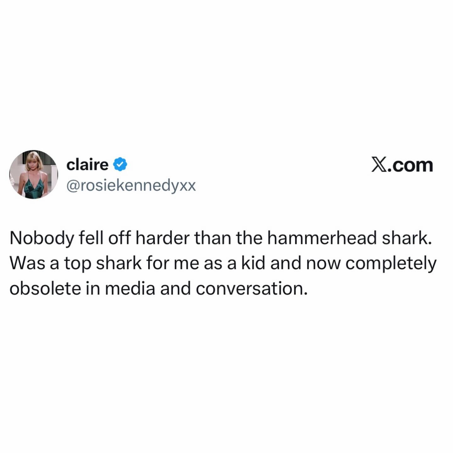 Witty tweet about the hammerhead shark losing its popularity and becoming obsolete in modern media conversations.
