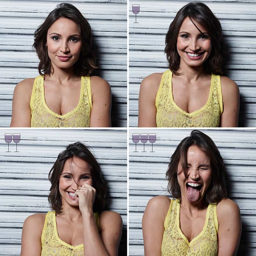 A woman in a yellow lace top laughing and making a funny face after three drinks.