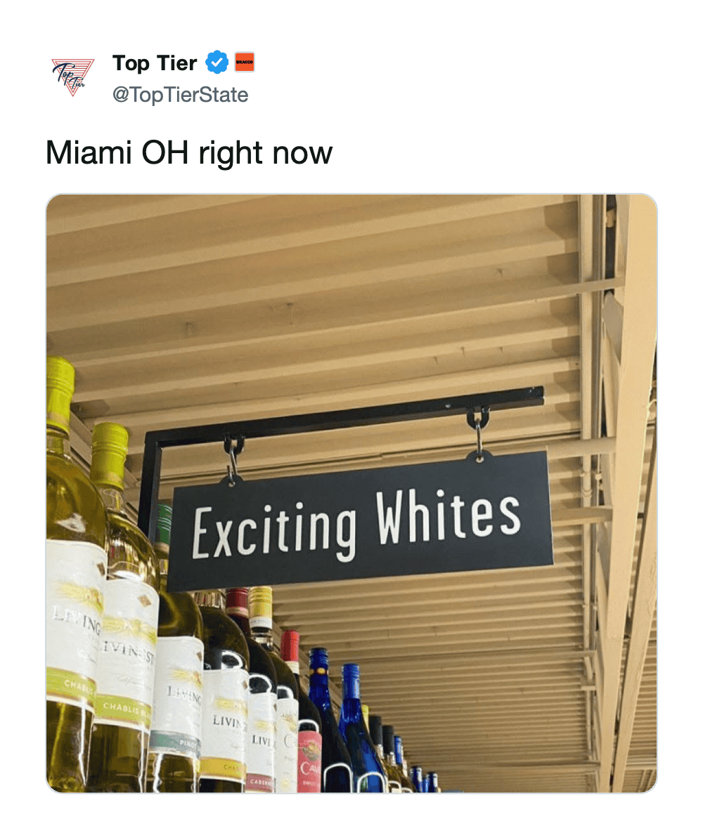 A clever March Madness meme using a grocery store wine aisle sign that reads "Exciting Whites" to playfully reference the Miami of Ohio basketball team's tournament prospects.