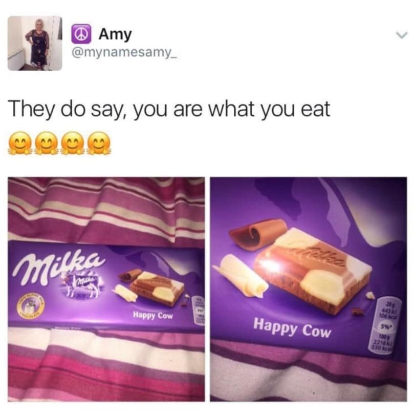 A meme dump entry showing two photos of a Milka "Happy Cow" chocolate bar resting on a striped blanket. The tweet from user @mynamesamy_ jokes, "They do say, you are what you eat," accompanied by four smiling emojis.