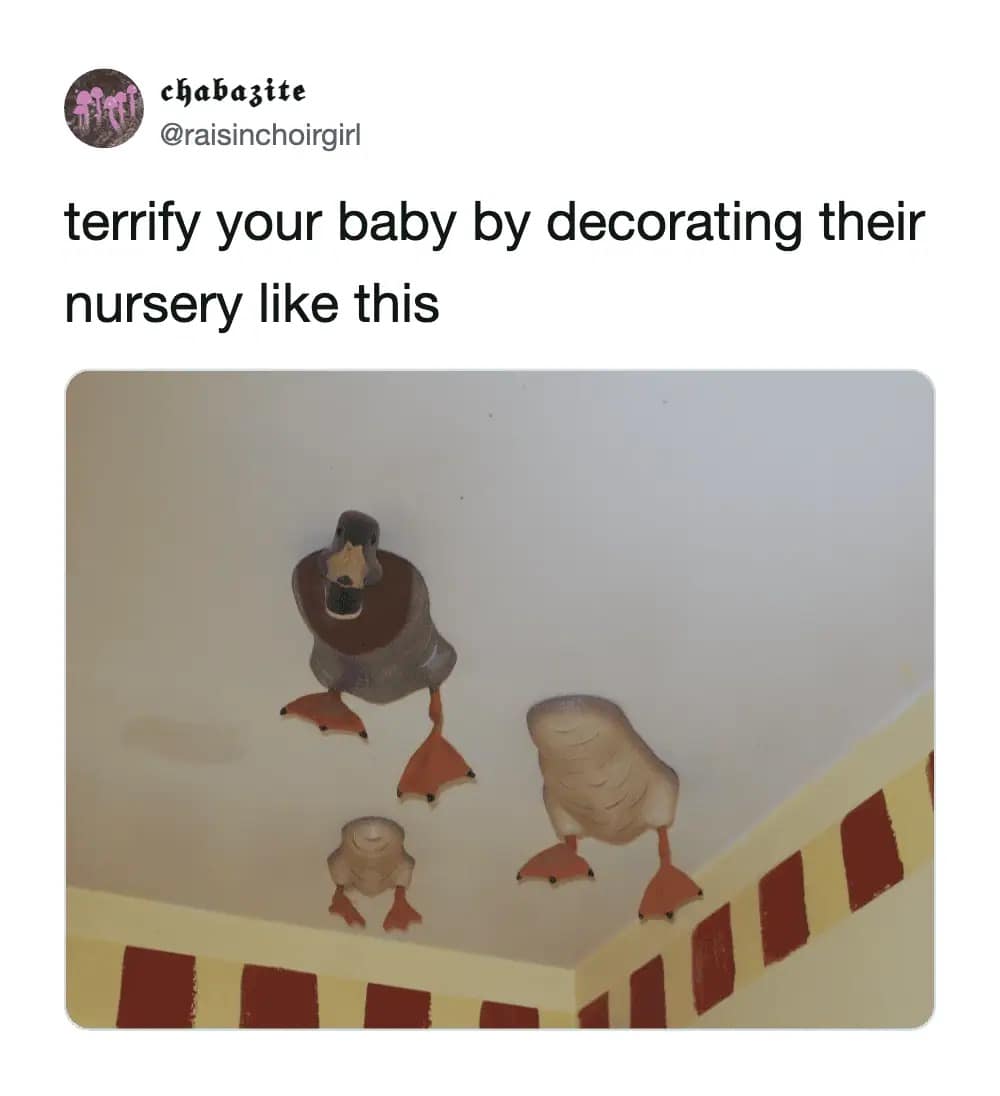 A terrifying funny meme showing a nursery ceiling decorated with 3D ducks that appear to be swimming through the drywall, showing only their submerged heads and orange feet.
