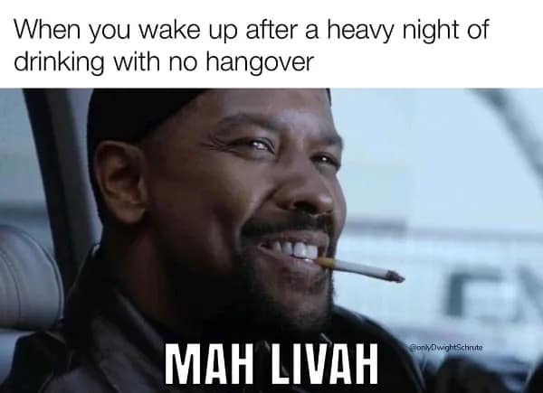 Denzel Washington from Training Day celebrating waking up without a hangover after a heavy night of drinking, captioning his relieved smile with mah livah to praise his resilient liver in this top-tier meme dump.
