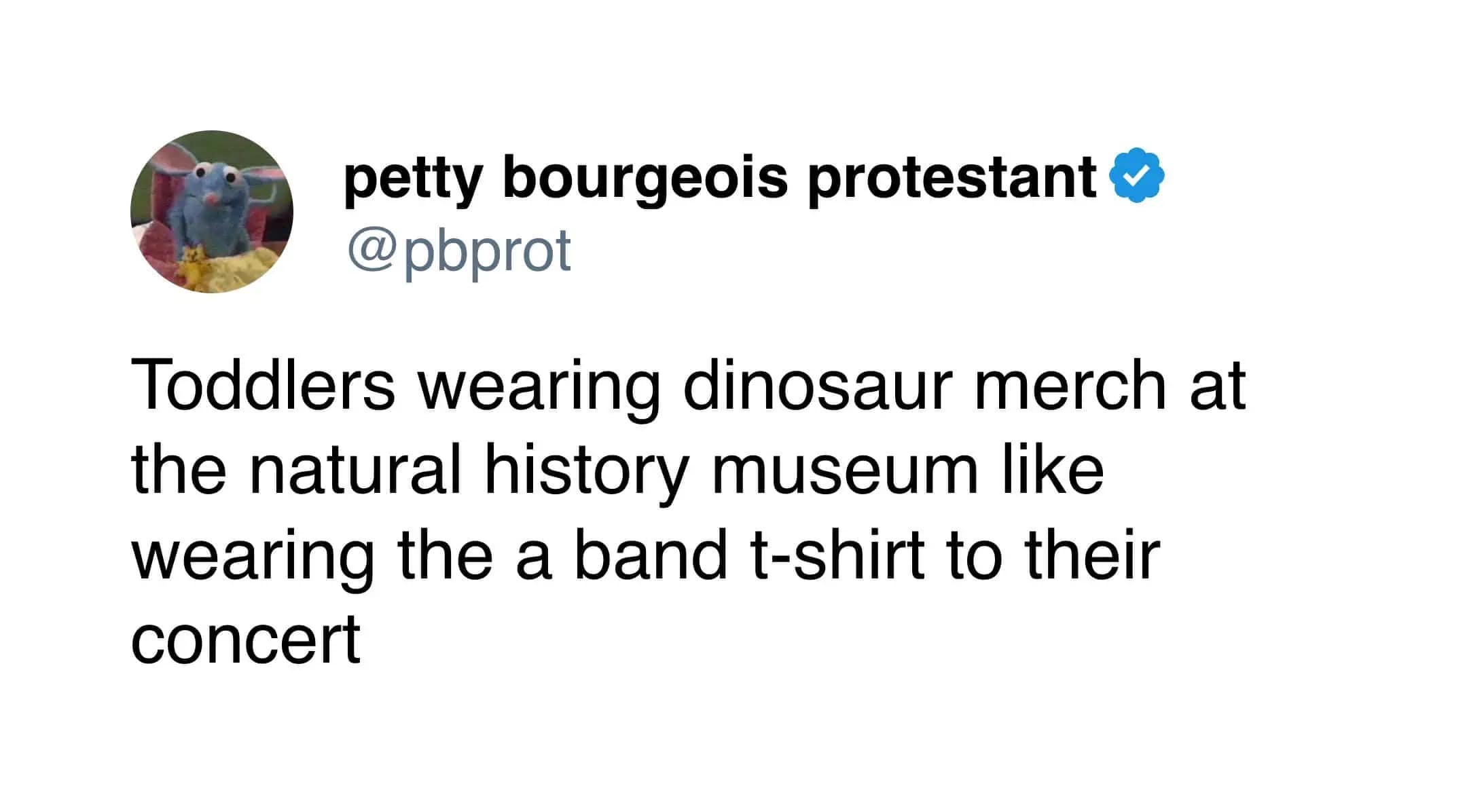 wholesome and funny meme tweet observing that toddlers wearing dinosaur merchandise at a natural history museum is the equivalent of fans wearing a band t-shirt to a concert.