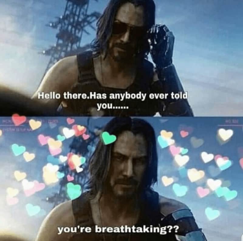 A wholesome relationship meme featuring Keanu Reeves as Johnny Silverhand from Cyberpunk 2077. In a two-panel format, he asks, "Hello there. Has anybody ever told you......" and the second panel shows him surrounded by colorful floating hearts with the punchline: "you're breathtaking??"