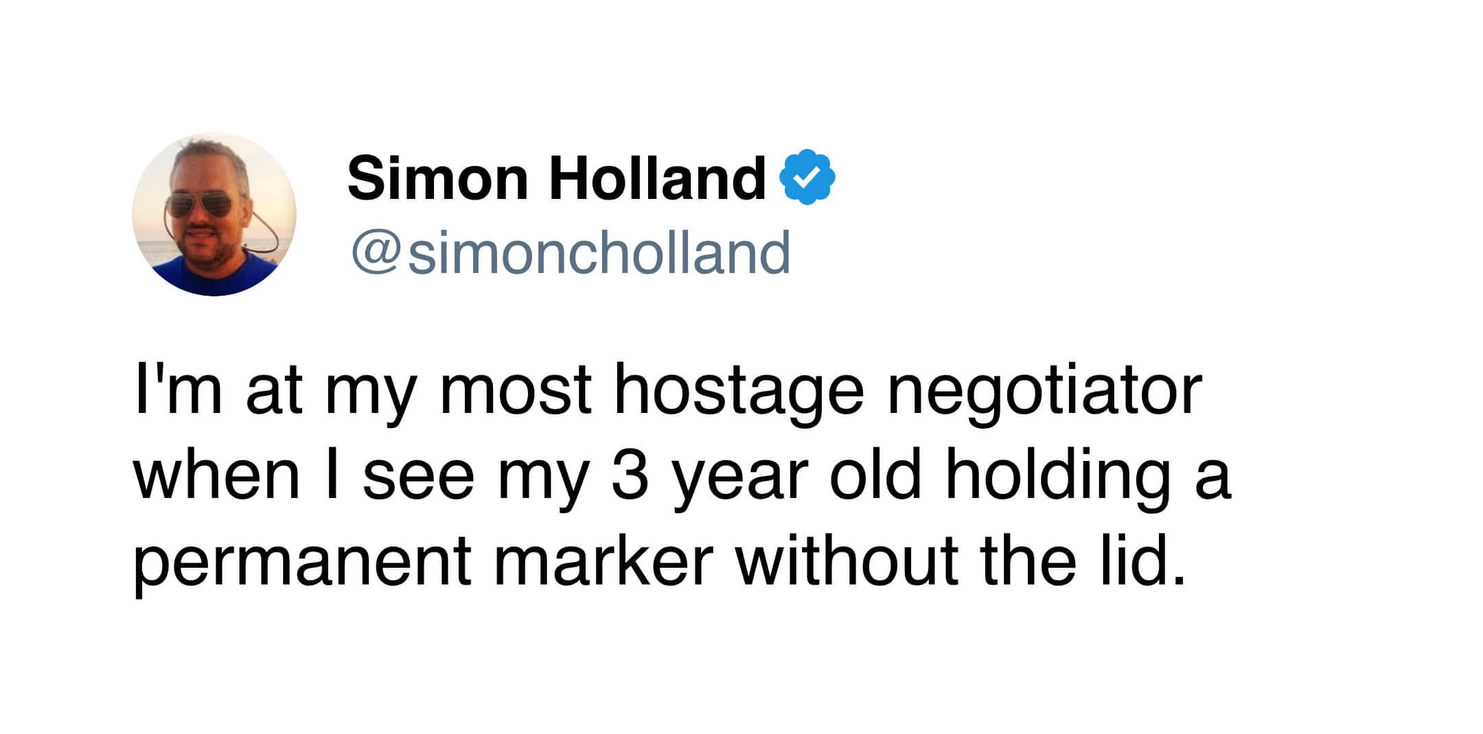 A text-based toddler meme from Simon Holland about the high-stakes tension of raising 3 year olds. The tweet explains that he enters "full hostage negotiator mode" the second he sees his child roaming the house with an uncapped permanent marker.