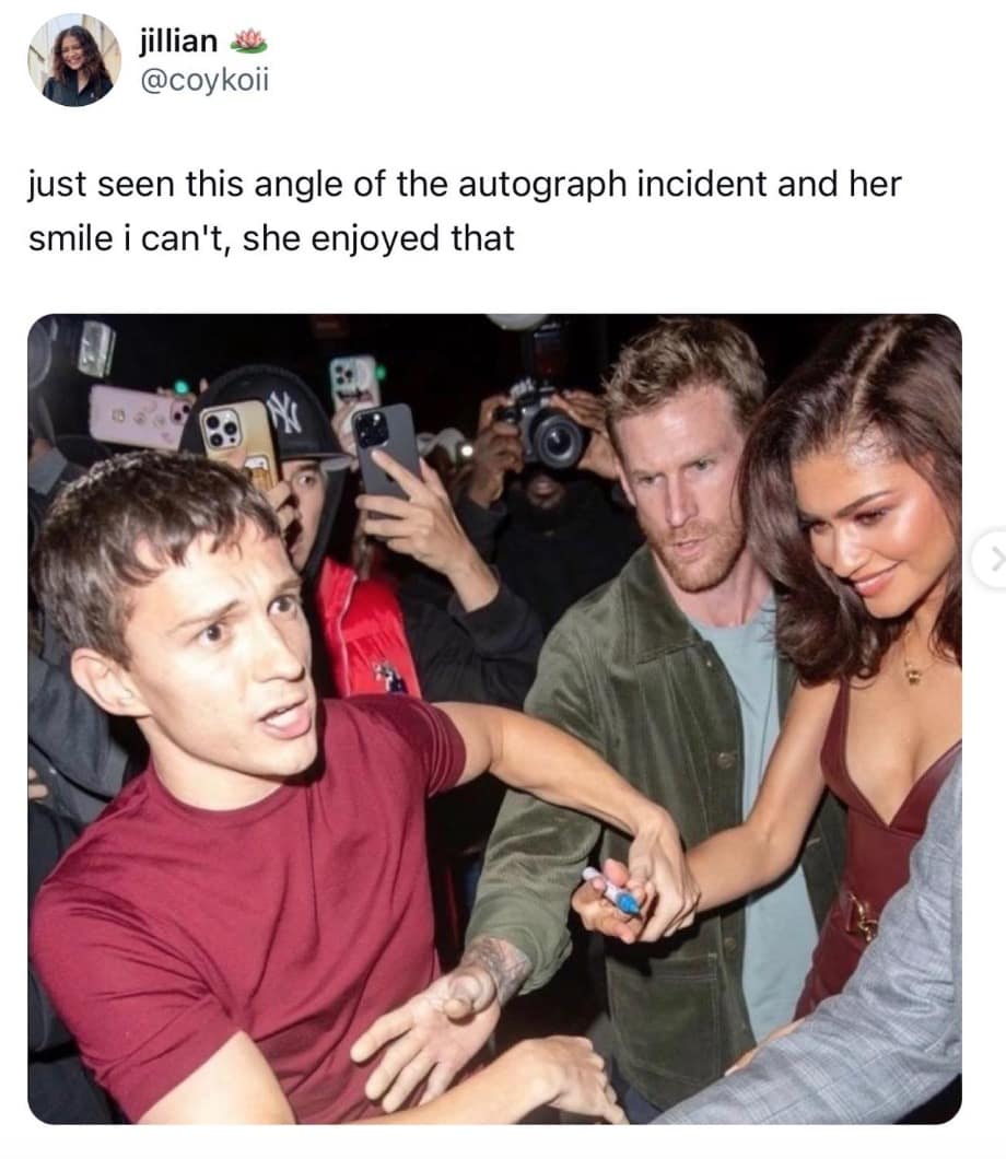 Viral Zendaya and Tom Holland meme showing an intense Tom aggressively protecting her from an autograph mob while Zendaya smiles lovingly at his protective boyfriend energy.