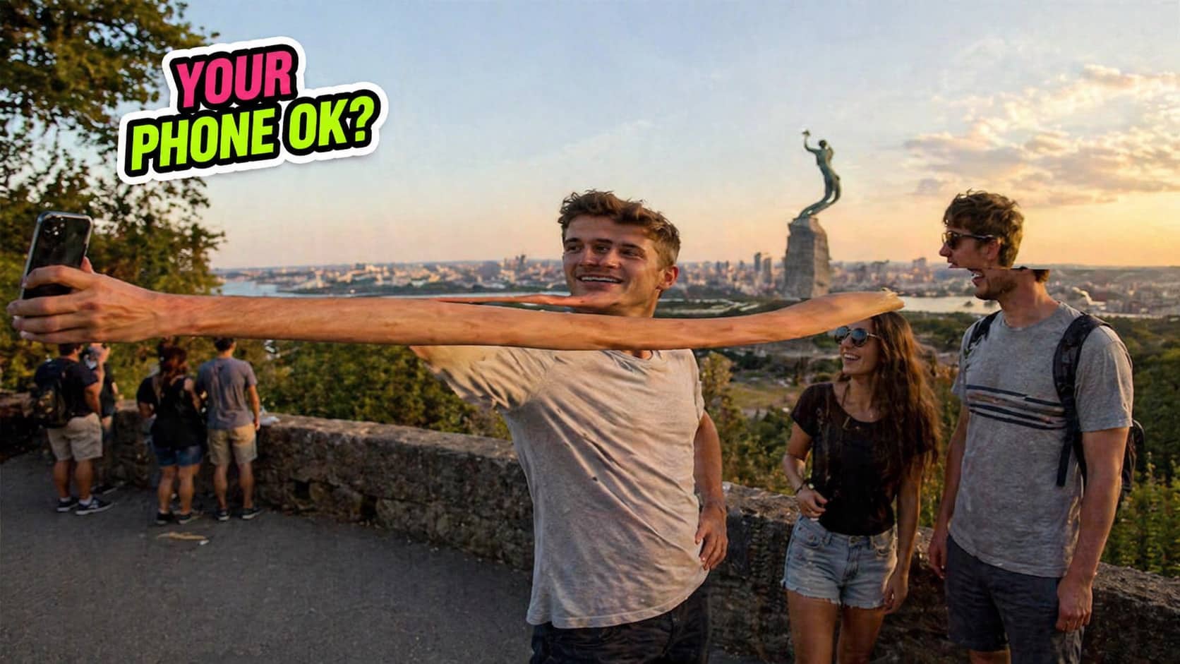 Distorted panorama fail showing a man with an unnaturally long arm taking a sunset selfie.