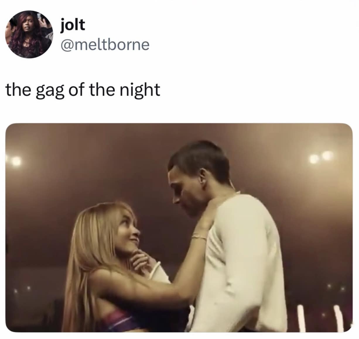 viral 2026 Coachella meme from @meltborne capturing the "gag of the night": a blurry, cinematic shot of Sabrina Carpenter and Barry Keoghan staring intensely into each other's eyes on stage, breaking the internet with their "it couple" energy.