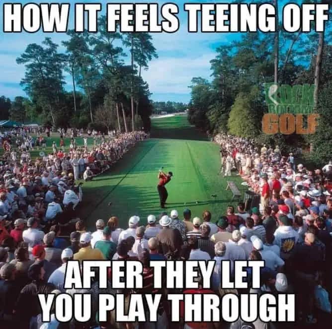 A high-pressure 2026 Masters meme showing Tiger Woods teeing off amidst a massive, dense gallery at Augusta. The top and bottom text reads, "HOW IT FEELS TEEING OFF AFTER THEY LET YOU PLAY THROUGH," comparing the intense scrutiny of a major championship to the social anxiety of a casual weekend round.
