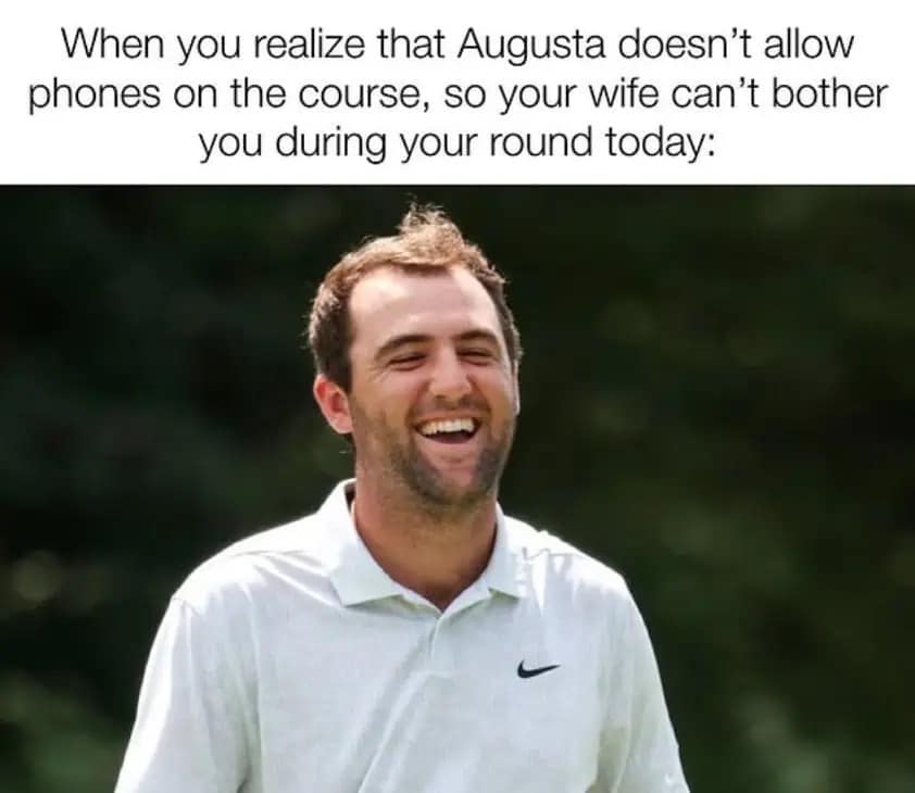 A cheeky 2026 Masters meme showing World No. 1 Scottie Scheffler laughing joyfully. The text observes, "When you realize that Augusta doesn’t allow phones on the course, so your wife can’t bother you during your round today," using the club’s strict technology ban as a punchline for domestic escapism.