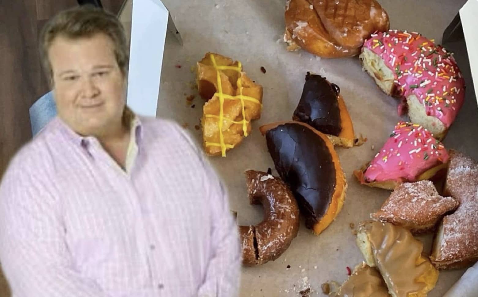 Eric Stonestreet from Modern Family standing next to a box of half-eaten donuts.