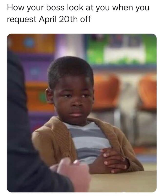 A classic 420 meme shows a young boy in a tan cardigan leaning over a desk to give a highly skeptical side-eye. The caption jokes about the immediate judgment and suspicion a boss has when an employee suddenly requests a random Monday in April off for no specific reason.