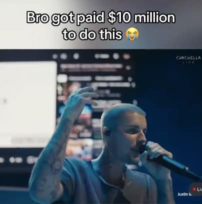 Bieberchella meme showing a grainy shot of Justin Bieber singing into a microphone with a web browser interface clearly visible on the screen behind him. The caption reads: "Bro got paid $10 million to do this 😭," highlighting the contrast between the massive paycheck and the intentionally "low-effort" stage production.